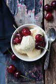 Vanilla ice cream with cherries