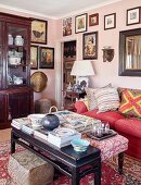 Gallery of pictures and ethnic art in eclectic living room