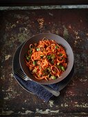 Sweet potato pasta with chard and olives in a tomato sauce