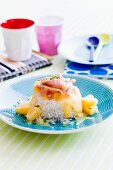 Rice with pineapple, cheese sauce and ham