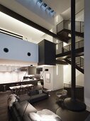 Patterns of dark and light in double-height black-and-white interior