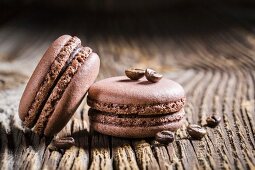 Coffee macaroons on a wooden table