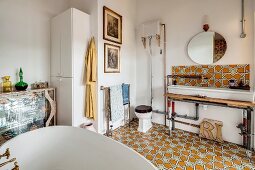 Ornate floor tiles in eclectic, retro bathroom