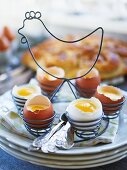 White chocolate mousse with peach slices in eggshells