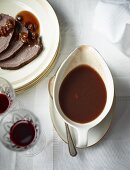 Sauerbraten (marinated pot roast) with sugar beet syrup and raisins