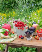 An arrangement of fruit on a garden table