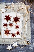 Star shaped almond biscuits filled with redcurrant jelly