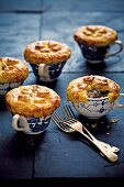 Puff pastry chicken pies baked in cups