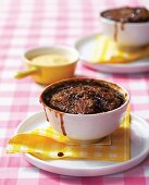 Self-saucing pudding with potatoes and carrots
