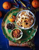 Pasta with orange pesto and black olives