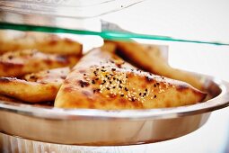 Arabian pastries with sesame seeds in a display case