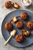 Pumpkin muffins filled with cream cheese