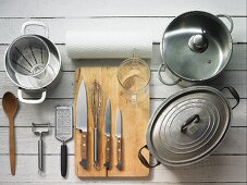 Kitchen utensils for roast goose and red cabbage