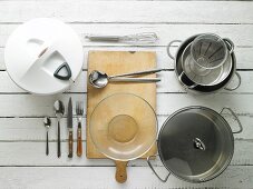 Utensils for making potato salad and sausages