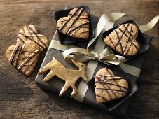 Heart-shaped Christmas biscuits with pumpkin seeds