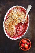 Strawberry crumble with oats and grated coconut