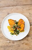 Grilled sweet potatoes with pistachio nuts and coriander