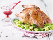 Pheasant with almond savoy cabbage and cranberry sauce