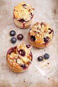 Almond muffins with blueberries baked in glasses