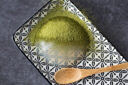 A raindrop cake with matcha tea powder (Japan)