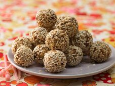 Energy bites made from dried fruits and sesame seeds