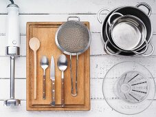 Kitchen utensils for making sweet pasta with damson compote