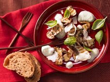 Grilled porcini mushrooms with pecorino cheese and basil foam