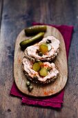 Slices of bread with Liptauer cheese spread and gherkins