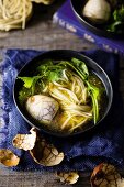 Marbled eggs with noodle soup (China)