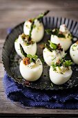Eggs filled with asparagus tips and blue cheese
