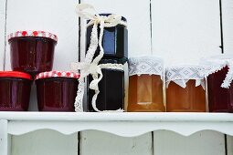 Various jam jars on a shelf