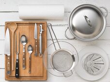 KItchen utensils for preparing vegetable soup with rice and beef