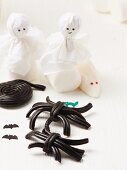 Licorice spiders, white mice and ghosts made from marshmallows for Halloween