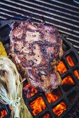 Rib-eye steak on the barbecue