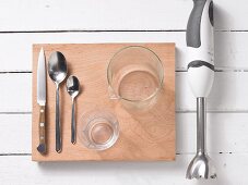 Assorted kitchen utensils for preparing smoothies