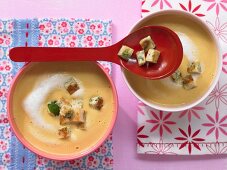 Carrot soup with pancake chunks