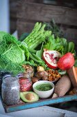 Vegetables, fruit, berries, seeds, and wheatgrass for superfood recipes