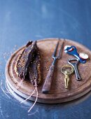 Biltong (air-dried meat, South Africa) on a wooden board