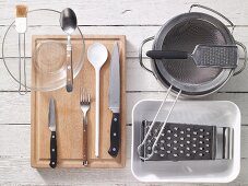 Kitchen utensils for gratinated Spätzle (soft egg noodles)