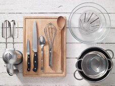 Kitchen utensils for preparing rhubarb compote with vanilla cream