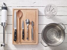 Assorted kitchen utensils for preparing creamy soups