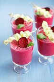 Cold beetroot soup with yoghurt, almonds and cucumber skewers