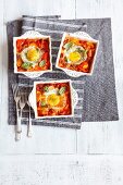 Oven-baked eggs with vegetables and sausage