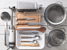 Kitchen utensils for preparing gnocchi and asparagus bake