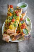 Vegan pizza with caramelised tomatoes and basil salt