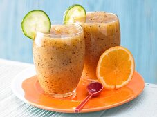 An exotic cucumber drink with papaya and orange