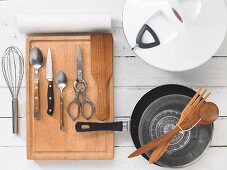 Assorted kitchen utensils for preparing salads