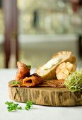 Marinated smoked salmon with bread and garlic