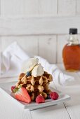 Waffles with mascarpone, berries and maple syrup