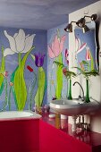 Mural of tulips in bathroom with red-painted wooden cladding and shelf